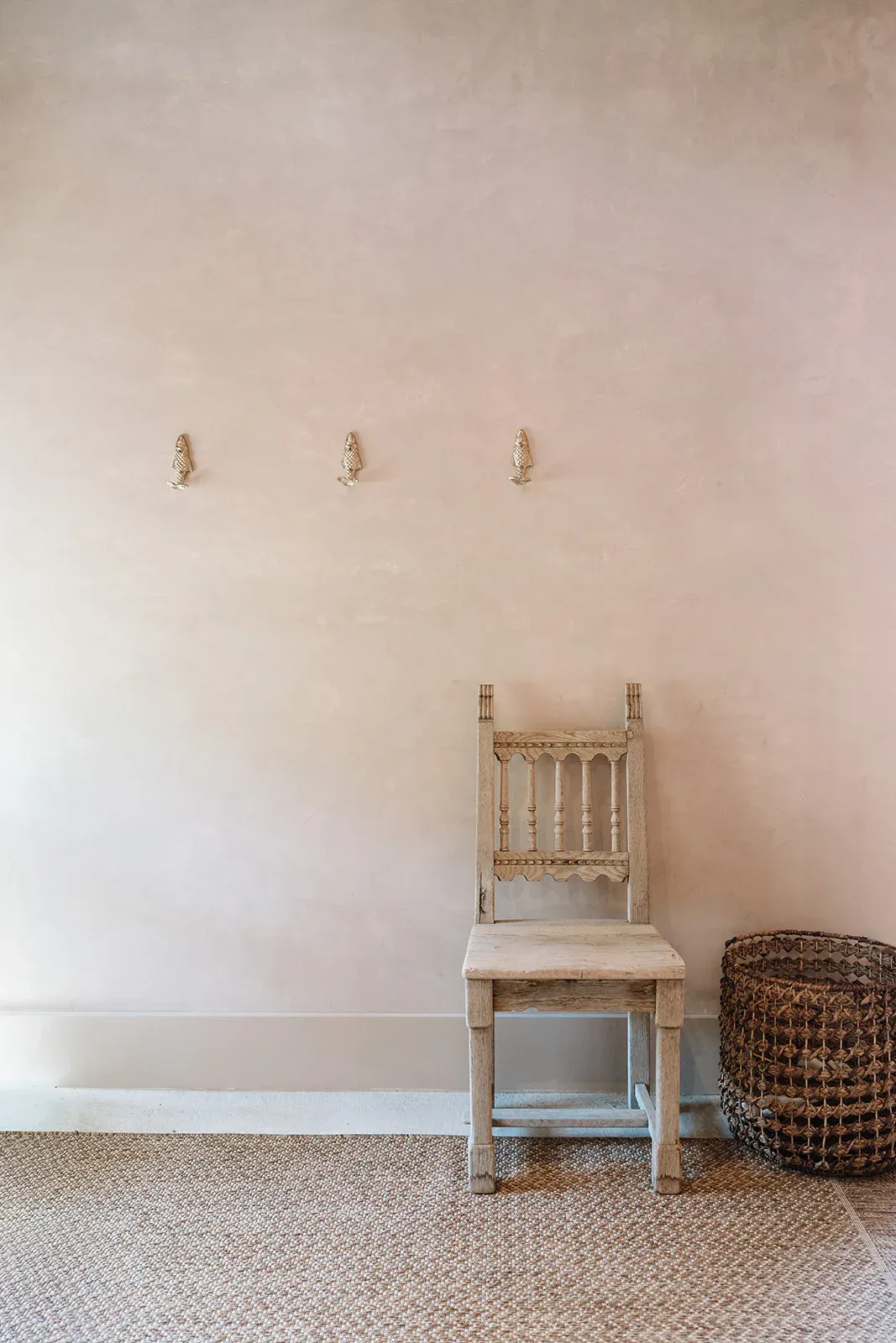 Minimal wall and chair detail inside the Serana lodge