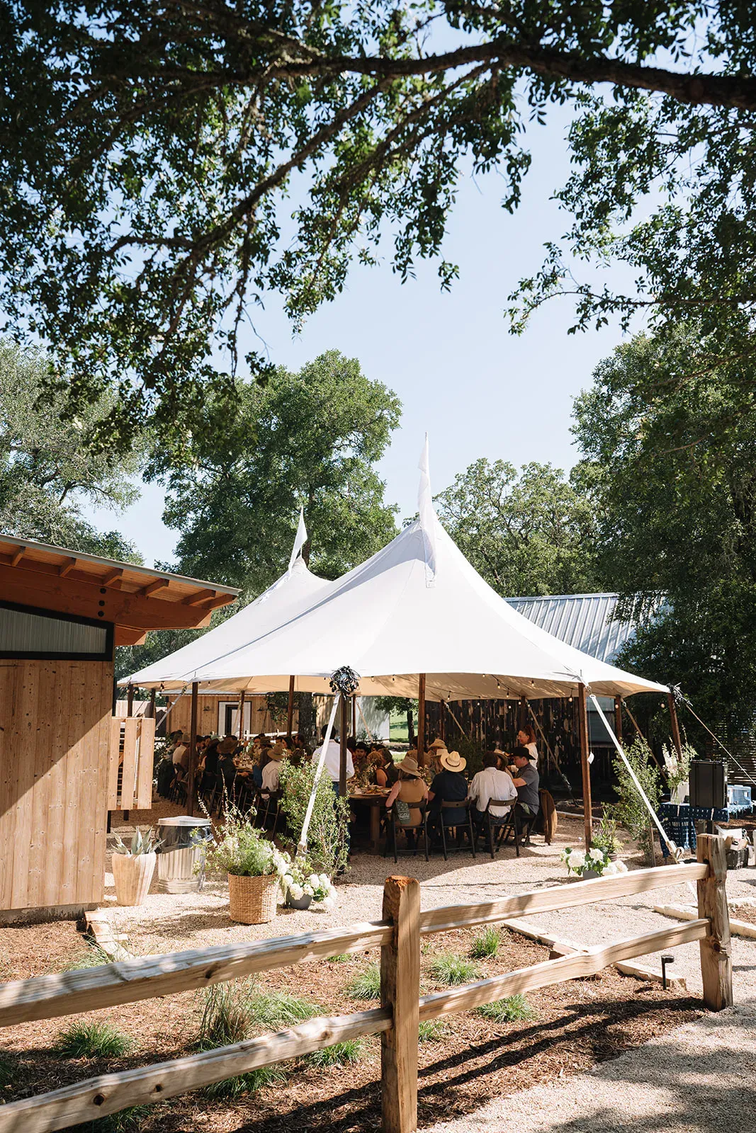 Sailcloth tent beside the Serana lodge prepared for a private gathering