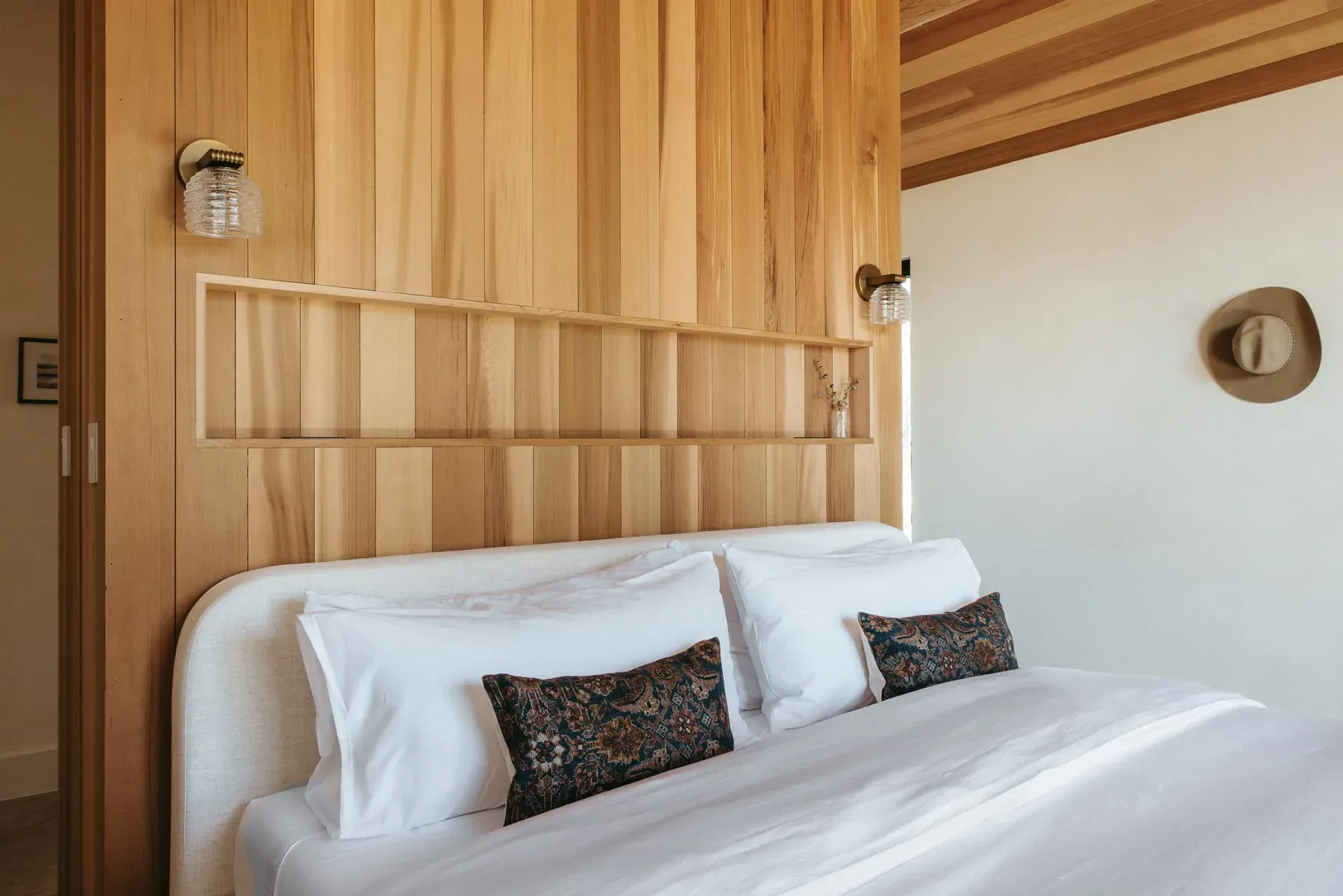 Serana cabin king bedroom with warm natural light