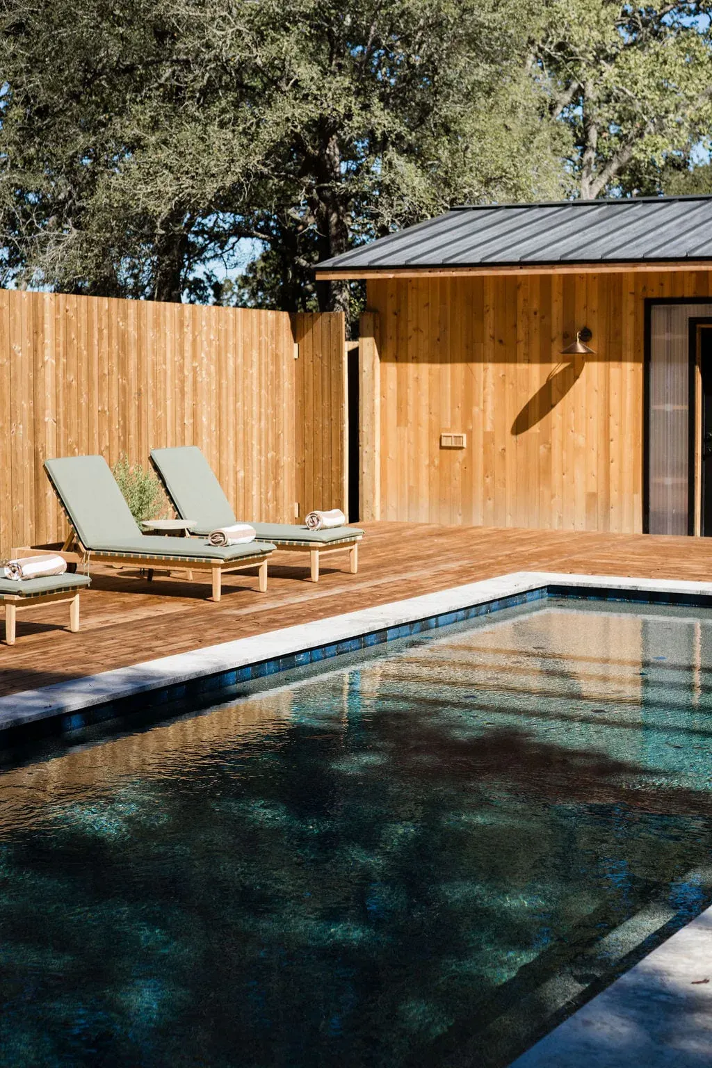 Saltwater pool edge and loungers at Serana