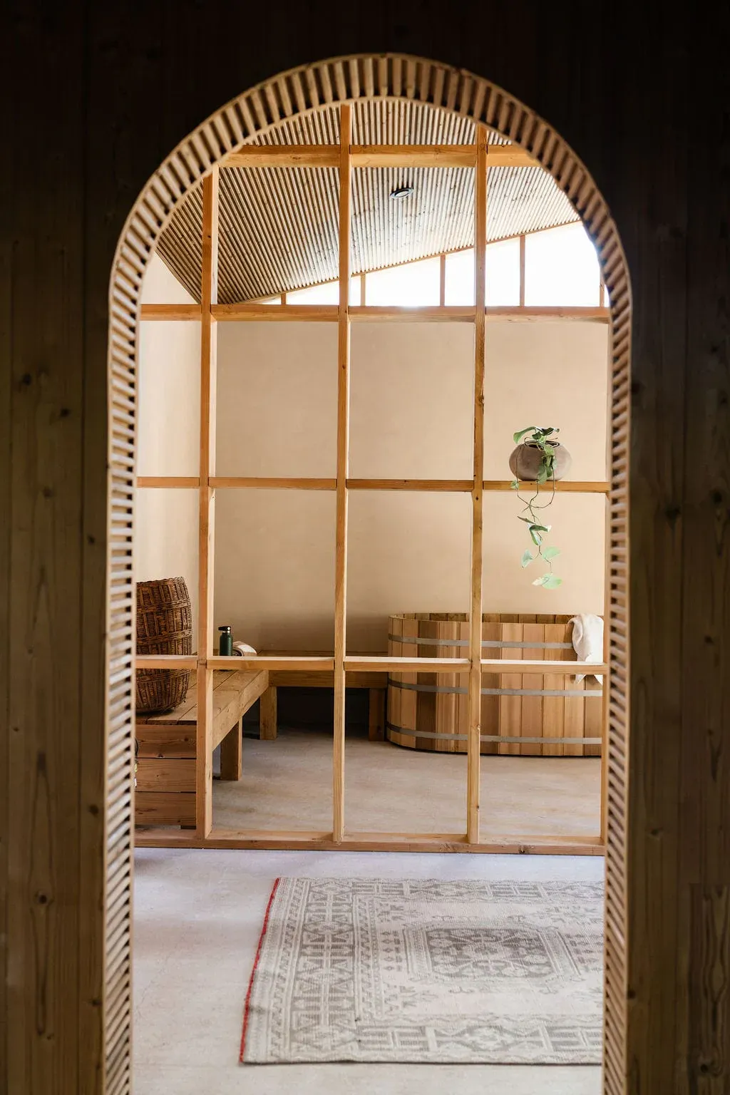 Spa house vanity arch and natural finishes at Serana